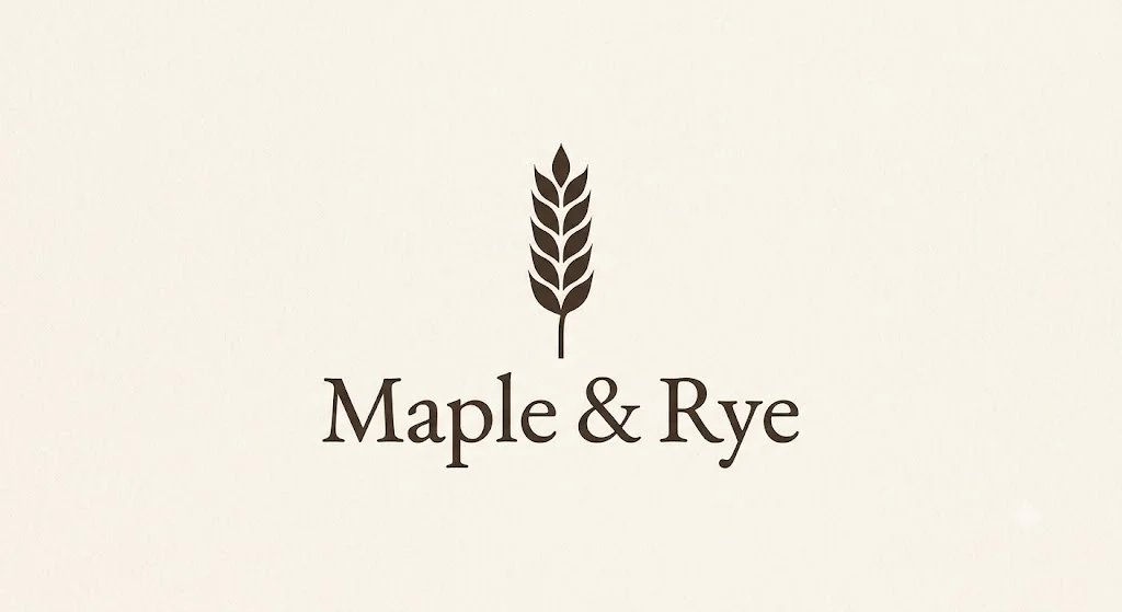 A Nano Banana logo for a bakery called Maple & Rye, with a dark brown wheat stalk above the name in a serif font on a cream background
